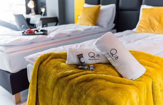 Q18 ApartHotel - Photo 53