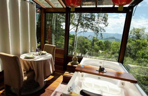 Chalé Romântico com Jacuzzi Próximo ao Templo Budista - Foto 2