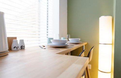 Bay City Studio Apartments - Foto 12