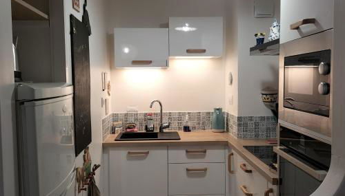 Appartement face mer - Photo 4, stove