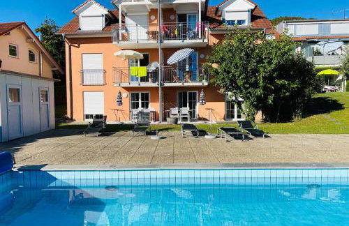 Das Schneckenhaus - Ferienwohnung mit Pool & Seeblick - Foto 16