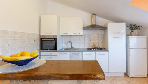 Apartment Petar in Begi - Foto 5, stove