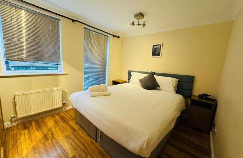 Cosy 2 Bedroom Canary Wharf House with Private Garden - Foto 13