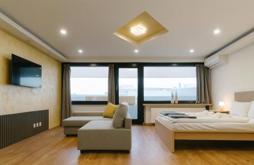 Modernes City Apartment in Top Lage, Balkon, kostenloser Parkplatz max 1,65m Höhe und 1,8m Breite - Foto 14