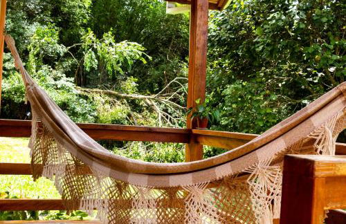 Chalé Canto do Galo 2 - Hidro da Jacuzzi, Lareira Ecológica, Cozinha Completa, Wi-Fi 80mbps, próximo a comércio local e relaxando ao som do riacho - Photo 22