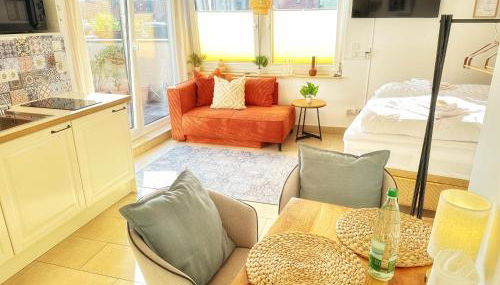 Zentrales Studio in Würzburg mit Dachterrasse und Tiefgarage - Foto 2, towels, stove