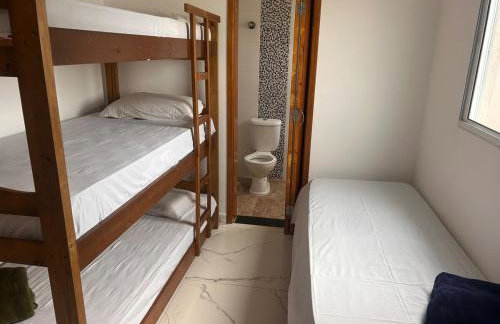 Casa em Itanhaém praia pé na areia - Photo 10