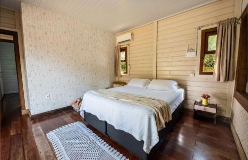 Casa Rústica com Piscina Privativa, Banheira de Hidromassagem, Ar-Condicionado, Pet friendly - Refúgio na Natureza a 5 Minutos do Centro de Imbituba, Perfeita para Famílias e Grupos - Photo 22