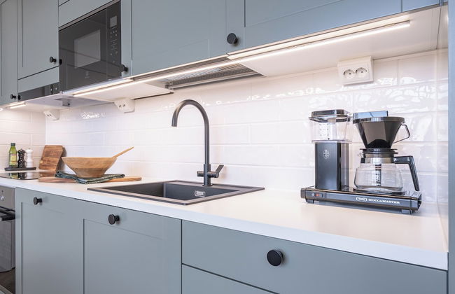 Historical 1BR Penthouse with Sauna - Photo 7