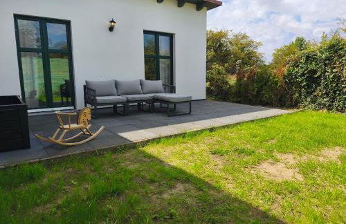 Modernes Ferienhaus mit 4 separaten Appartements, je mit vollausgestatteter Küchenzeile und eigenem Bad, 2 Gehminuten zum Badesee, Garten, Grillplatz, Kinderspielbereich, Hunde sind willkommen - Foto 36