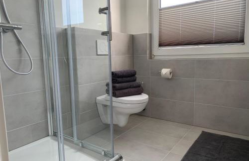 FEDDERSEN LIVING Moderne Ferienwohnungen - Gemütlich - Netflix - Voll ausgestattet - Waschmaschine - zentral gelegen - Foto 5