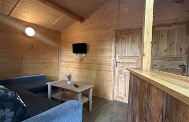 Domek nad jeziorem Wilczyńskim dla czterech osób, sypialnia z łożem małżeńskim oraz salon z rozkładanym narożnikiem - Photo 17