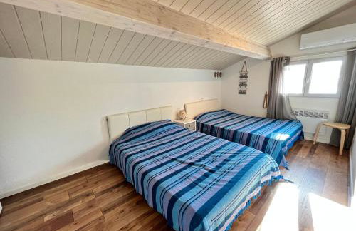 Belle villa entièrement climatisée 4 chambres 10 couchages, fibre WIFI, 2 terrasses parking privatif dans résidence sécurisée piscine commune 800 m de la mer LRCS69 - Foto 11