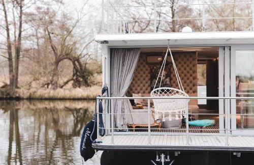 Deine schwimmende Auszeit auf dem Wasser -Festlieger Hausboot Tobago - Foto 1