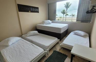Apartamento Aconchego Frente Mar - Vila Guilhermina Praia Grande SP - Cozinha Completa - Climatizador de Ar - TV a Cabo - Wi-Fi - Photo 9