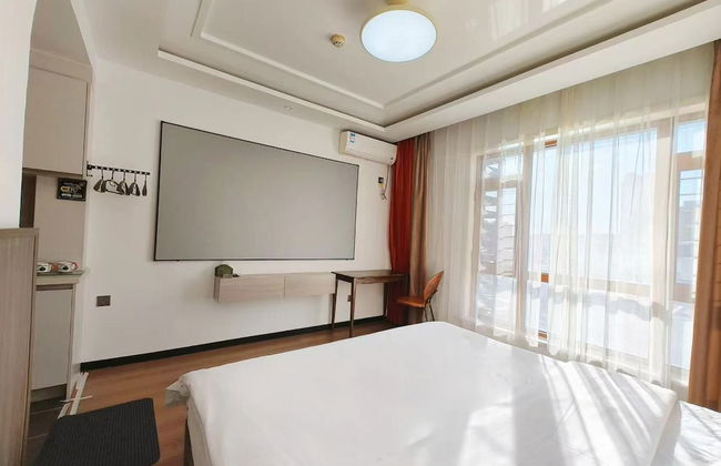 Dalian Bo Ke Business Apartment - Foto 26