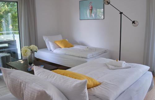 NXT LIV I Kliniknah I 120qm mit Balkon I Nah zu Seen & Berge - Foto 30