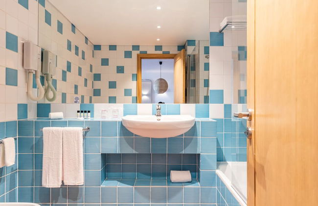 The Patio Suite Hotel - Photo 22