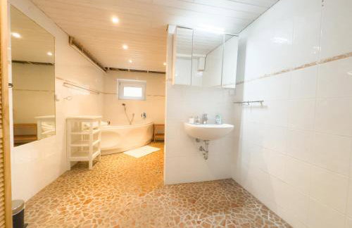 Souterrain Apartment mit eigenem Eingang und Terasse - Foto 22