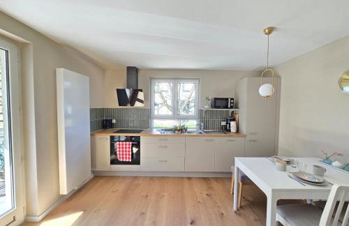 Charmante 3-Schlafzimmer Wohnung mit Garten - Foto 2