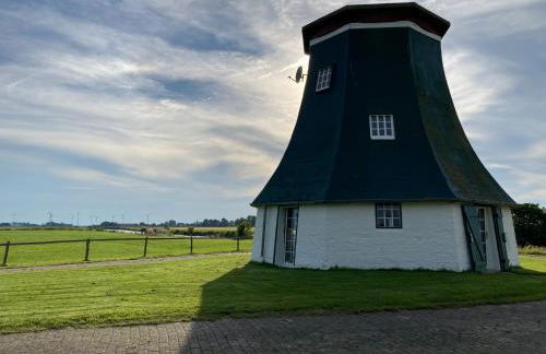 Windmühle am Fluss in Altfunnixsiel - Foto 2