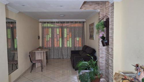 Aconchego da Marci Grande quarto confortável - Foto 5