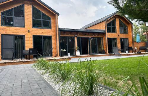 DOMKI Leśna Cisza jezioro Powidzkie dla 18 osób - 5D Apartments - Foto 1