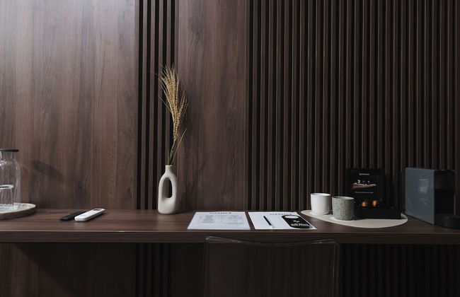 DISTRICT boutique - Photo 22