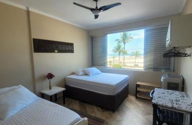 Apartamento Aconchego Frente Mar - Vila Guilhermina Praia Grande SP - Cozinha Completa - Climatizador de Ar - TV a Cabo - Wi-Fi - Photo 7