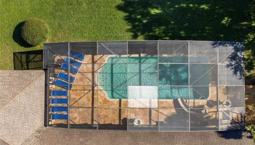 BRAND NEW! Lakefront 9BR Pool Hot Tub Outdoor Kitchen BBQ Theater 2 miles Disney - Foto 2