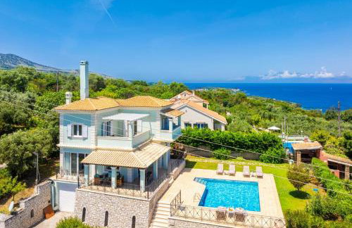 Villa Eleni Agios Stephanos - Photo 4