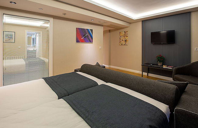 Moss Suites Hotel - Photo 17