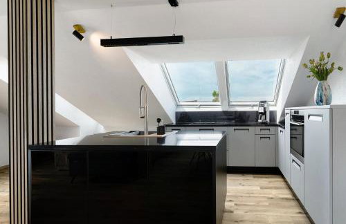 Moderne offene Dachgeschoßwohnung - Foto 7