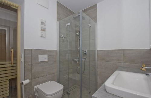 eigene Sauna, moderne Ferienwohnung in Wassernähe mit Meerblick - Ferienwohnung Heimathafen, gratis Nutzung vom AHOI Erlebnisbad und Sauna in Sellin - Foto 15