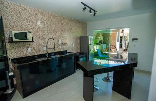 Casa com Piscina, Quadra de Areia e Churrasqueira - Foto 11