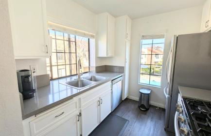 Poolside 2BR Condo with Balcony & Workspace - Photo 13