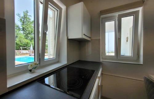 Apartment für 4 Personen mit Jacuzzi und Pool - Foto 8