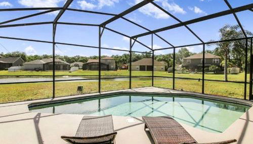 CozyCove near Disney Universal Pool Home Sleeps 10 - Foto 4, sunbed