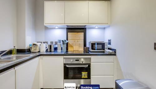 Last-Minute Secure l Sleeps Up to 8 l 2 Bedroom Apt By Capital Retreats Short Lets & Serviced Accommodation London With Balcony, Free WiFi - Foto 5, stove, dishwasher, toaster