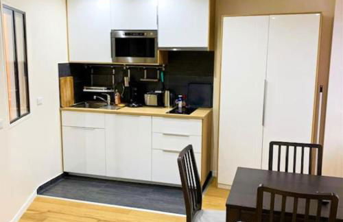 Cosy Appart Jouy Proche HEC - RER C N2 - Foto 5