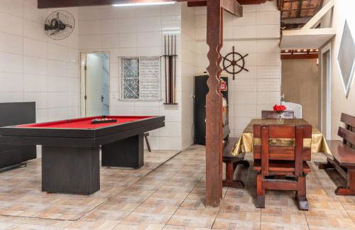 Casa Lindíssima e Espaçosa com 2 Piscinas - Adulto e Infantil, Perto da Praia, Opção da Piscina Adulto Aquecida Cobrado à Parte, 4 Quartos Frente as Piscinas, Área Gourmet Completa com Churrasqueira, Forno e Fogão a Lenha, Mesa de Bilhar, Lareira na Sala - Photo 14