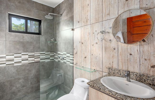 Ultramodern Townhome with an Inviting Coastal Design and Lush Outdoor Oasis with a Private Pool - Photo 19