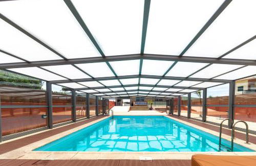 O CANTINHO ENTRE A RIA E O MAR - with hot water pool all year round - Foto 1