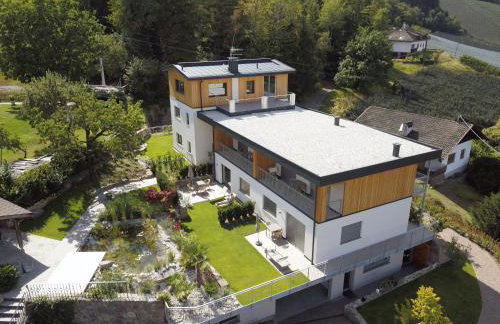 Felsenegg appartements - moderne Wohnungen im Luftkurort mit traumhaftem Garten Nähe Meran für Paare und Familien - Foto 15