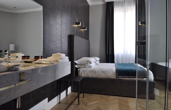 Place 24 Suites & Wellness - Photo 1