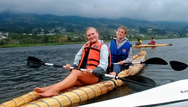 Row in a traditional canoe in Otavalo!
