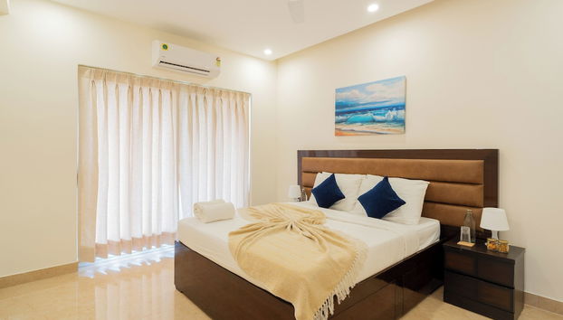 Alaya Stays Luxfort 1 BHK Apartment - Foto 5, Habitación