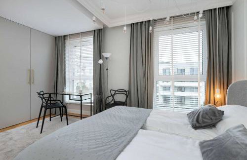 Elegant Apartment with Parking Space and Balcony by Noclegi Renters - Foto 17