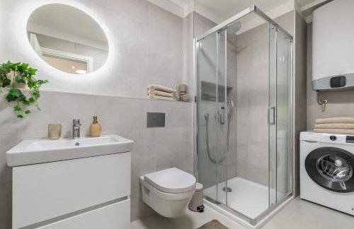 Boutique Soft Tones with Balcony and Secured Garage - Photo 6