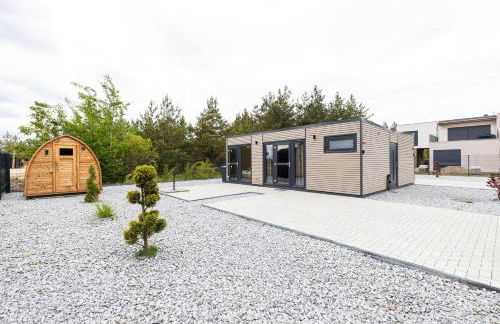 NORA Stays Tiny House direkt am See - Sauna - Klima - Foto 1